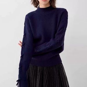 Brand new navy blue sweater with braided sleeve